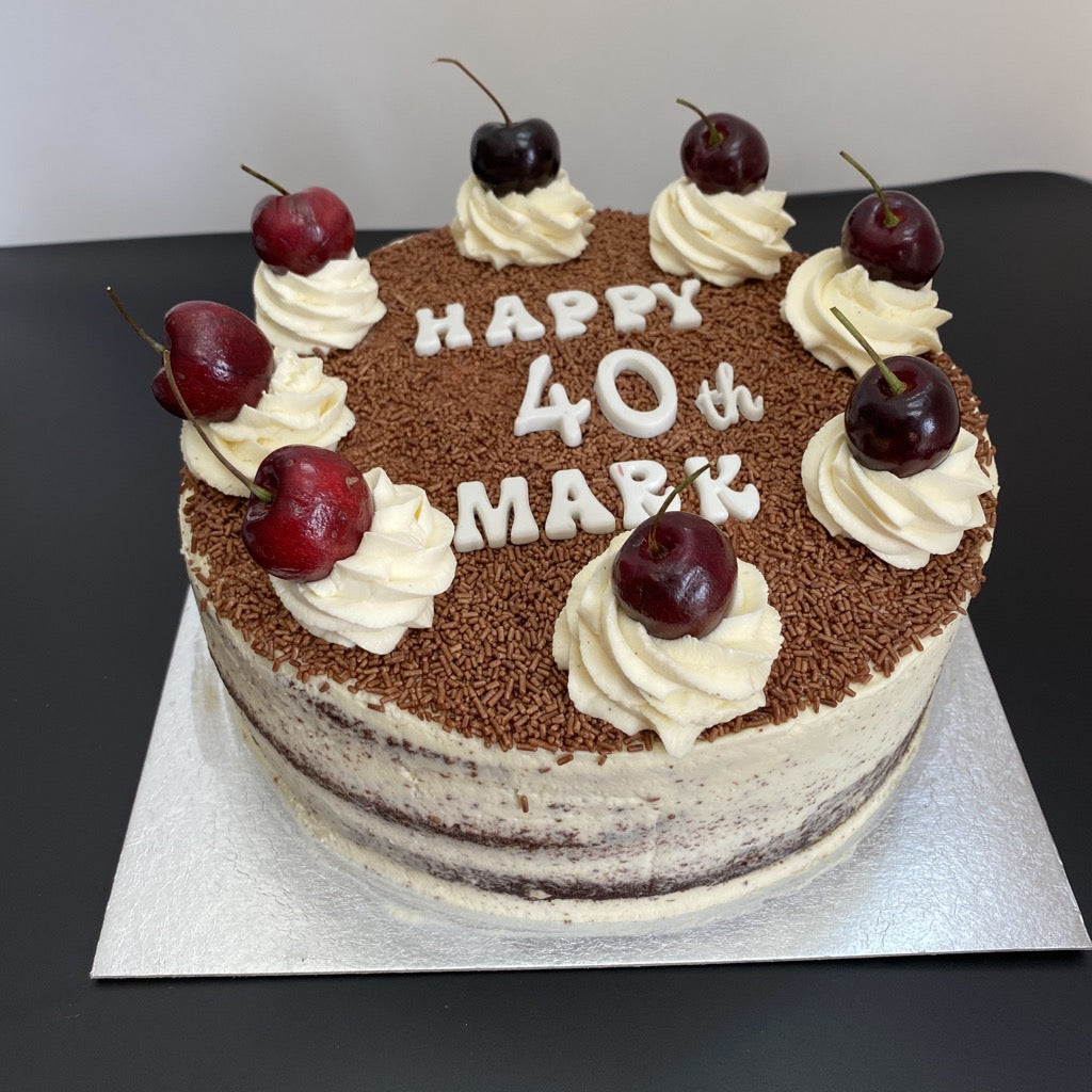 Image of Yasmin Bakery & Catering amazing black forest cake Several layers of chocolate sponge cake sandwiched with whipped cream and cherries.
