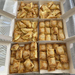 Load image into Gallery viewer, Image of a sections of Bourekas pastries from Yasmin Bakery &amp; Cartering
