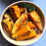 Load image into Gallery viewer, Closer image of Yasmin Bakery &amp; Catering classic caramelised sweet potato dish
