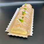 Load image into Gallery viewer, Our Lemon Cake Roll is a delicious, lemony sponge cake filled with a sweet yellow cream, it is fluffy, moist, refreshing and so delicious. This gorgeous, tasty cake roll is the perfect dessert to finish any big meal or just to share in a party to impress your family and friends.
